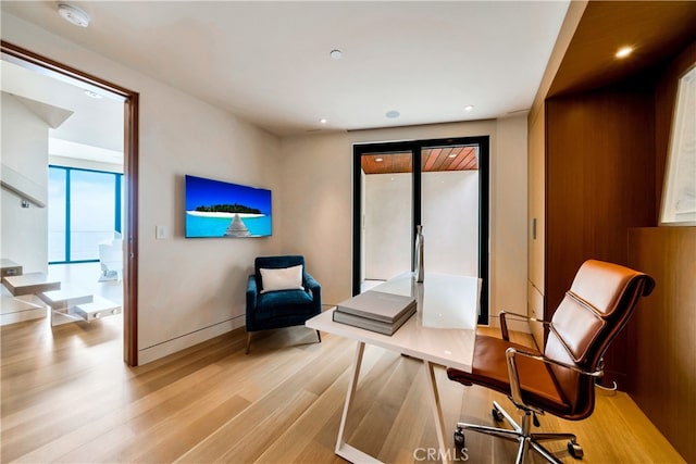 sitting room featuring light wood-type flooring