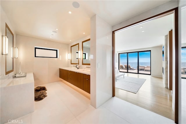 bathroom featuring hardwood / wood-style flooring and vanity