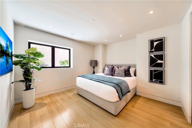 bedroom featuring light wood-type flooring