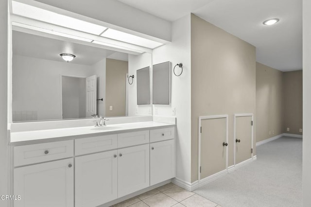 bathroom with vanity and tile patterned floors