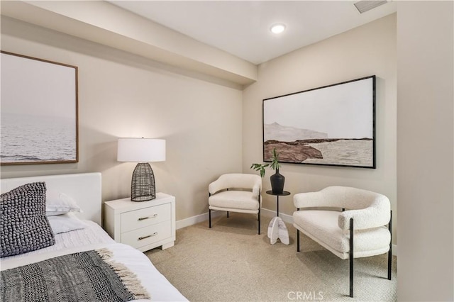 bedroom featuring light colored carpet