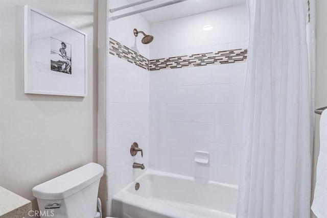 full bathroom with vanity, toilet, and shower / tub combo with curtain