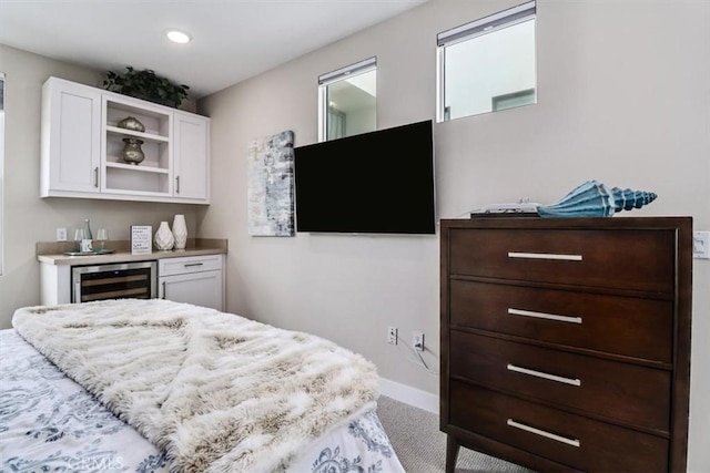 bedroom with bar and beverage cooler