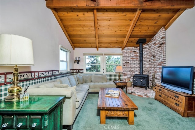 unfurnished living room featuring brick wall, wooden ceiling, a wood stove, carpet flooring, and vaulted ceiling