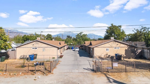 view of front of home with a mountain view