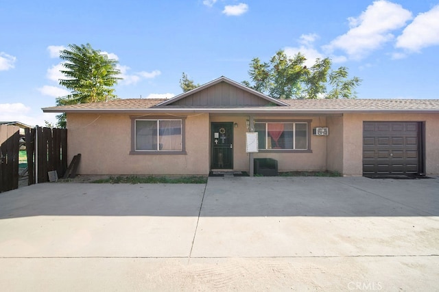 single story home with a garage