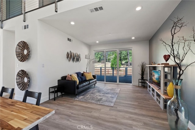 living room with wood-type flooring