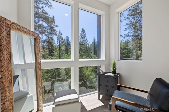 sunroom / solarium featuring a healthy amount of sunlight