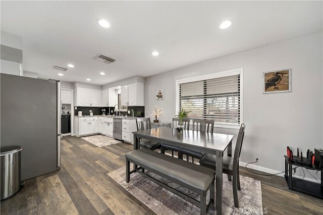 7410 Frontera Ave, Yucca Valley, CA 92284 - dining space with dark hardwood / wood-style floors