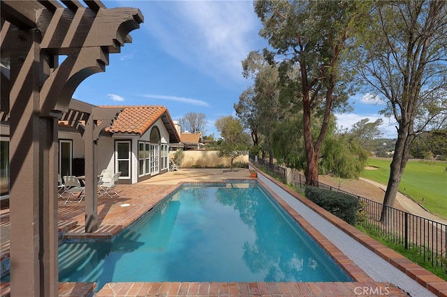 view of pool featuring a patio