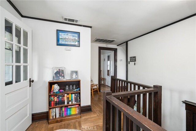 corridor featuring light hardwood / wood-style flooring