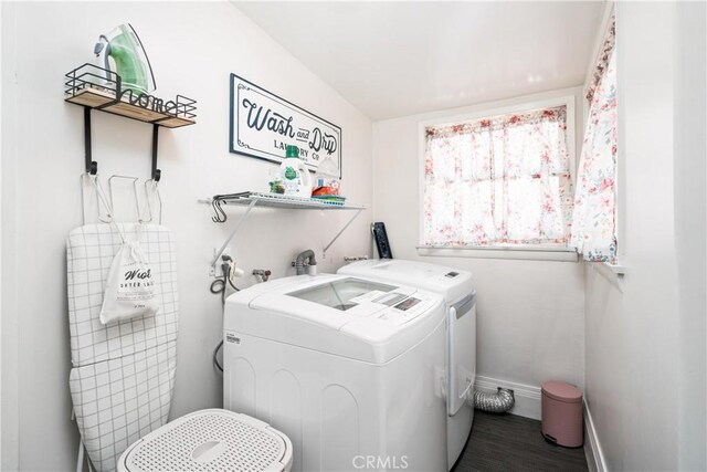 laundry room featuring washing machine and clothes dryer