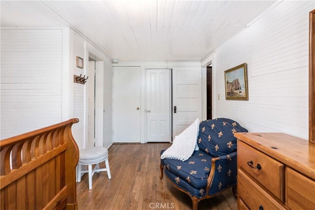 sitting room featuring hardwood / wood-style flooring