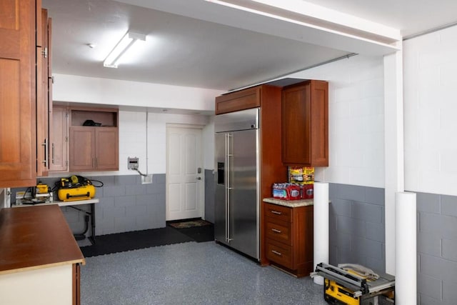 kitchen with stainless steel built in fridge