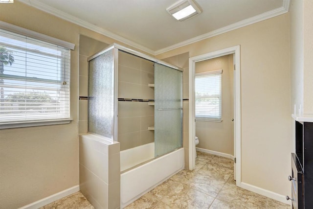 bathroom with tile patterned floors, enclosed tub / shower combo, toilet, and ornamental molding