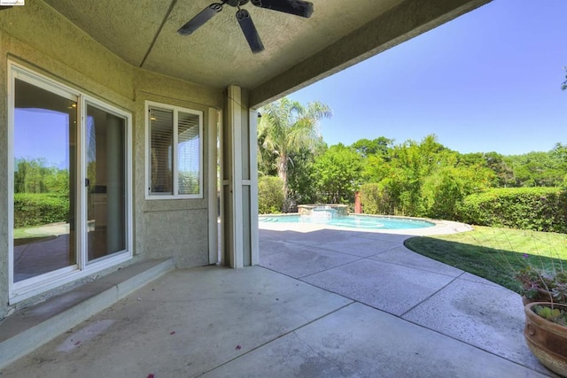 view of patio / terrace featuring ceiling fan