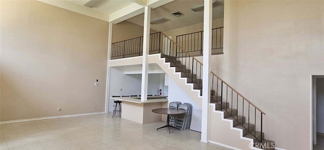 stairs with a high ceiling