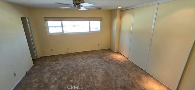 unfurnished bedroom with carpet flooring and ceiling fan