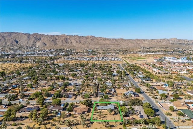 bird's eye view with a mountain view