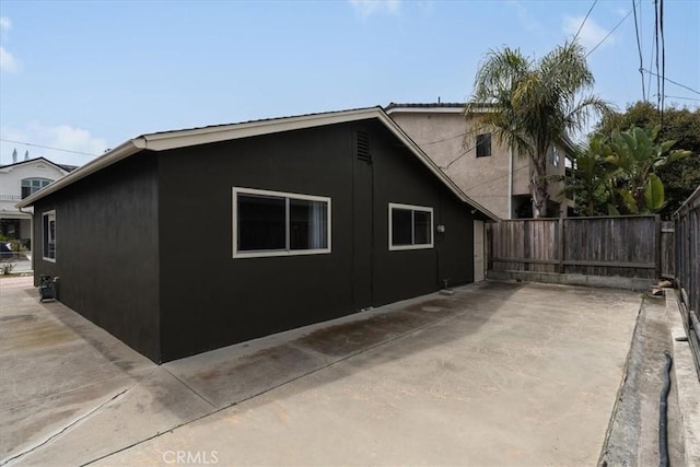 view of home's exterior with a patio area