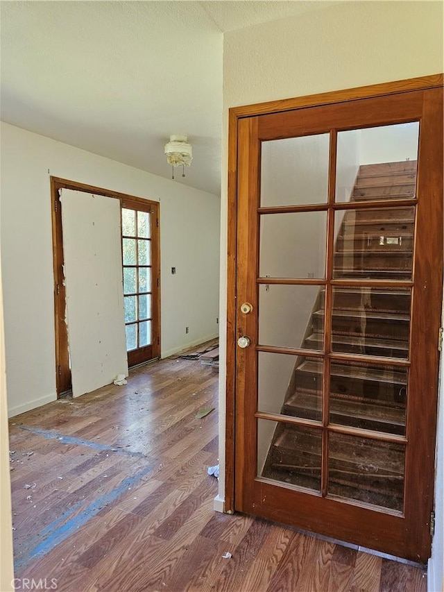 interior space with hardwood / wood-style flooring