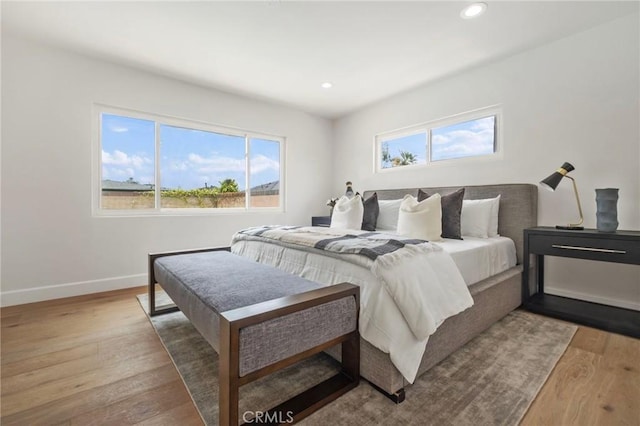 bedroom featuring light wood-type flooring