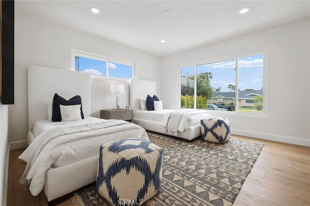 bedroom with light hardwood / wood-style flooring