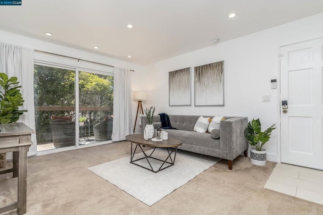 living room featuring light carpet