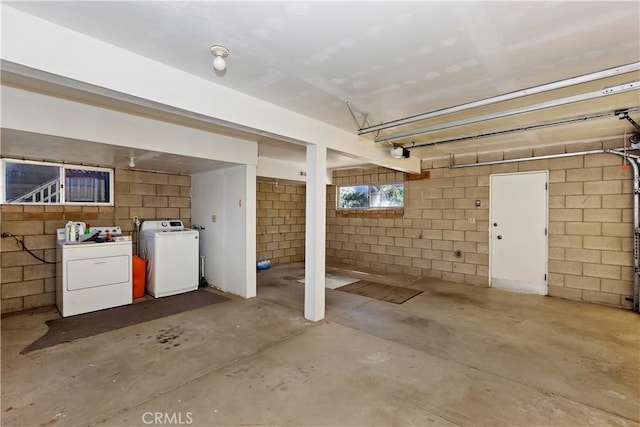 basement featuring separate washer and dryer