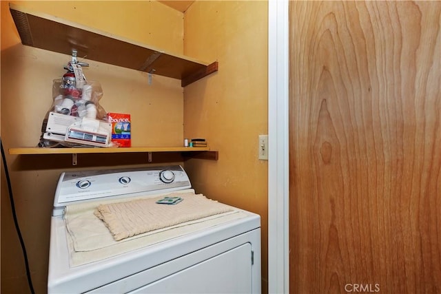 washroom featuring washer / dryer