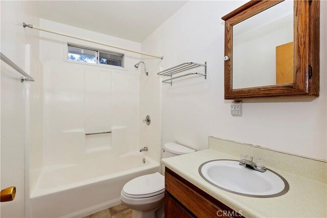 full bathroom featuring bathtub / shower combination, toilet, and vanity