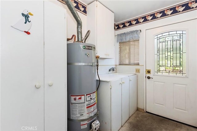 utility room with strapped water heater