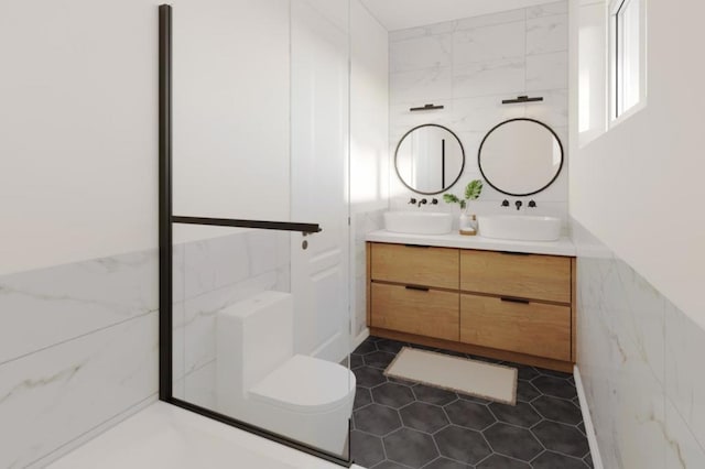 bathroom featuring vanity, toilet, and tile patterned floors