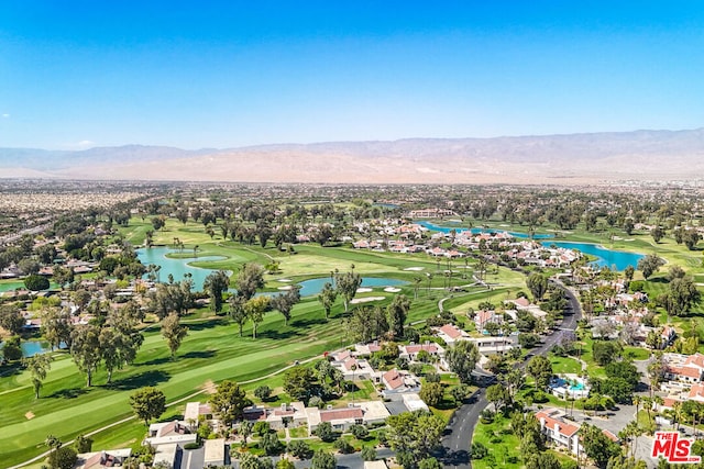 bird's eye view with a water and mountain view