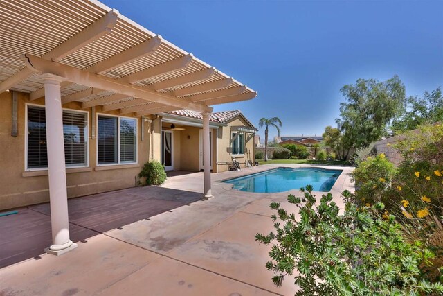 view of swimming pool with a pergola and a patio area