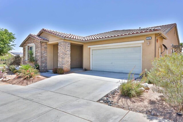 view of front of property with a garage