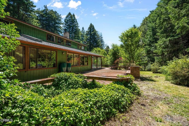 view of yard with a deck