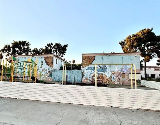 view of front of home featuring a playground