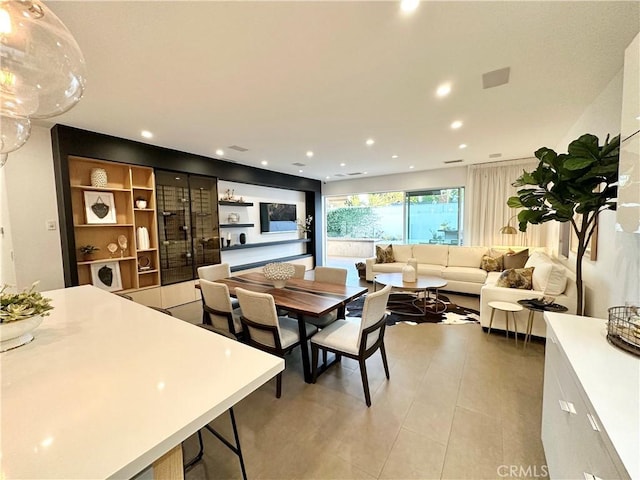 23028 W Mobile St, West Hills, CA 91307 - dining area with light tile patterned floors and recessed lighting