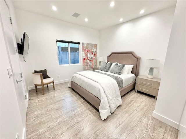 23028 W Mobile St, West Hills, CA 91307 - bedroom with recessed lighting, light wood-style flooring, and baseboards