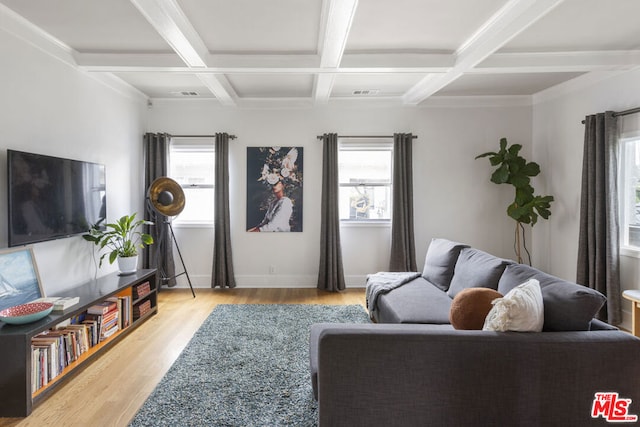 living room with coffered ceiling, beam ceiling, and light hardwood / wood-style floors