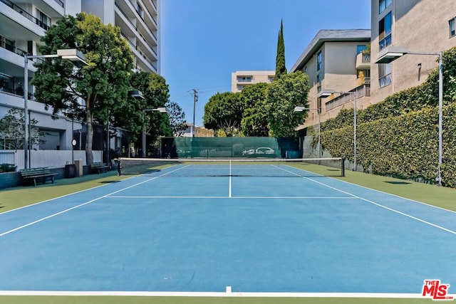 view of sport court featuring basketball court