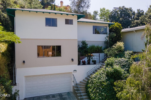 view of front of home with a garage