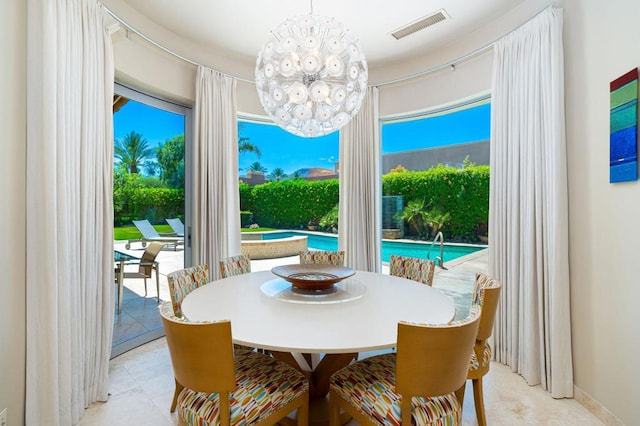 dining room featuring a notable chandelier