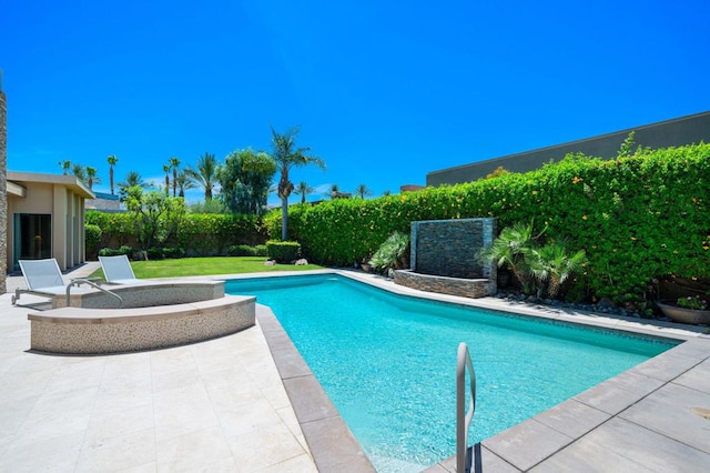 view of swimming pool featuring a patio