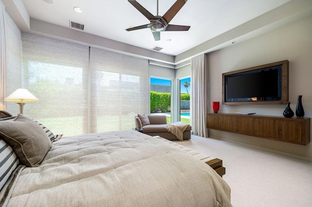 bedroom with ceiling fan and carpet flooring