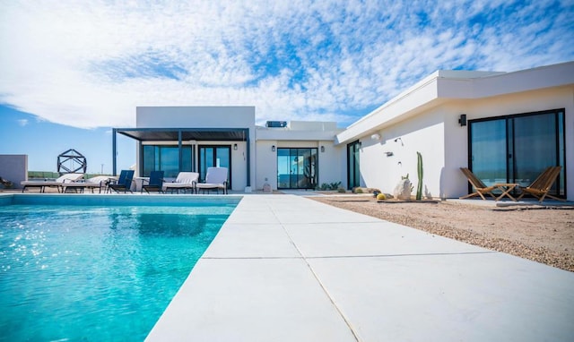 rear view of property with a patio area