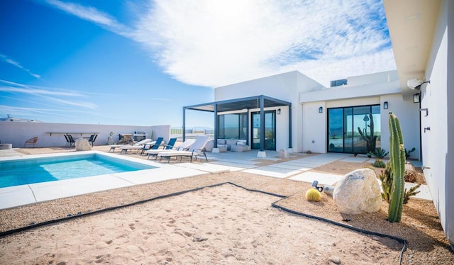 view of swimming pool featuring a patio area