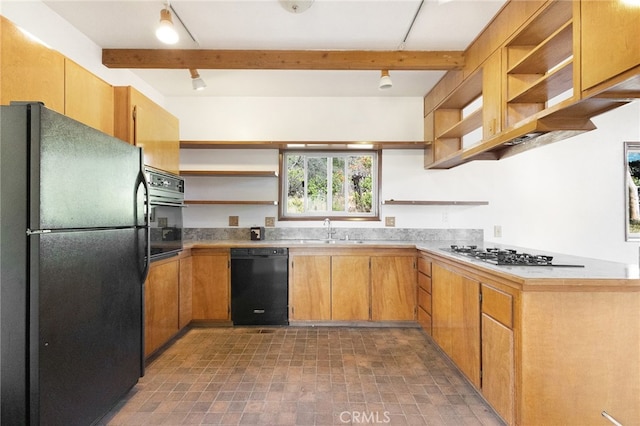 kitchen featuring sink and black appliances