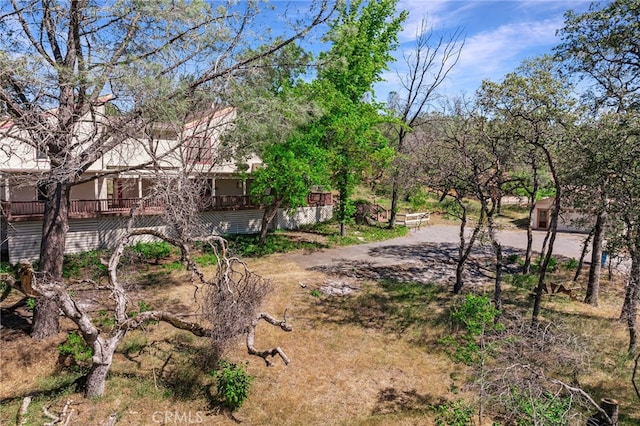 view of yard with a deck